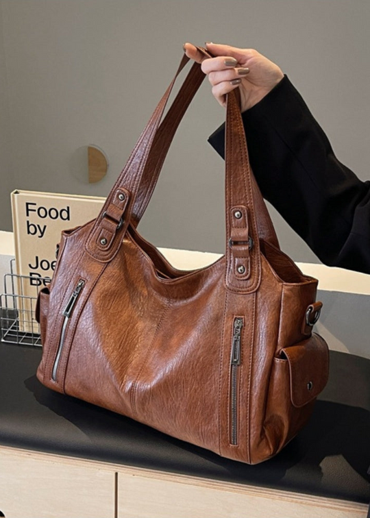 Ange leren tas